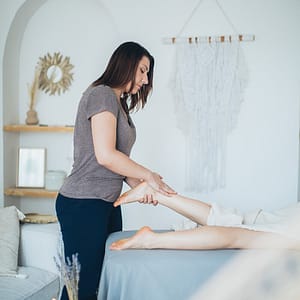 massage therapist doing massage business